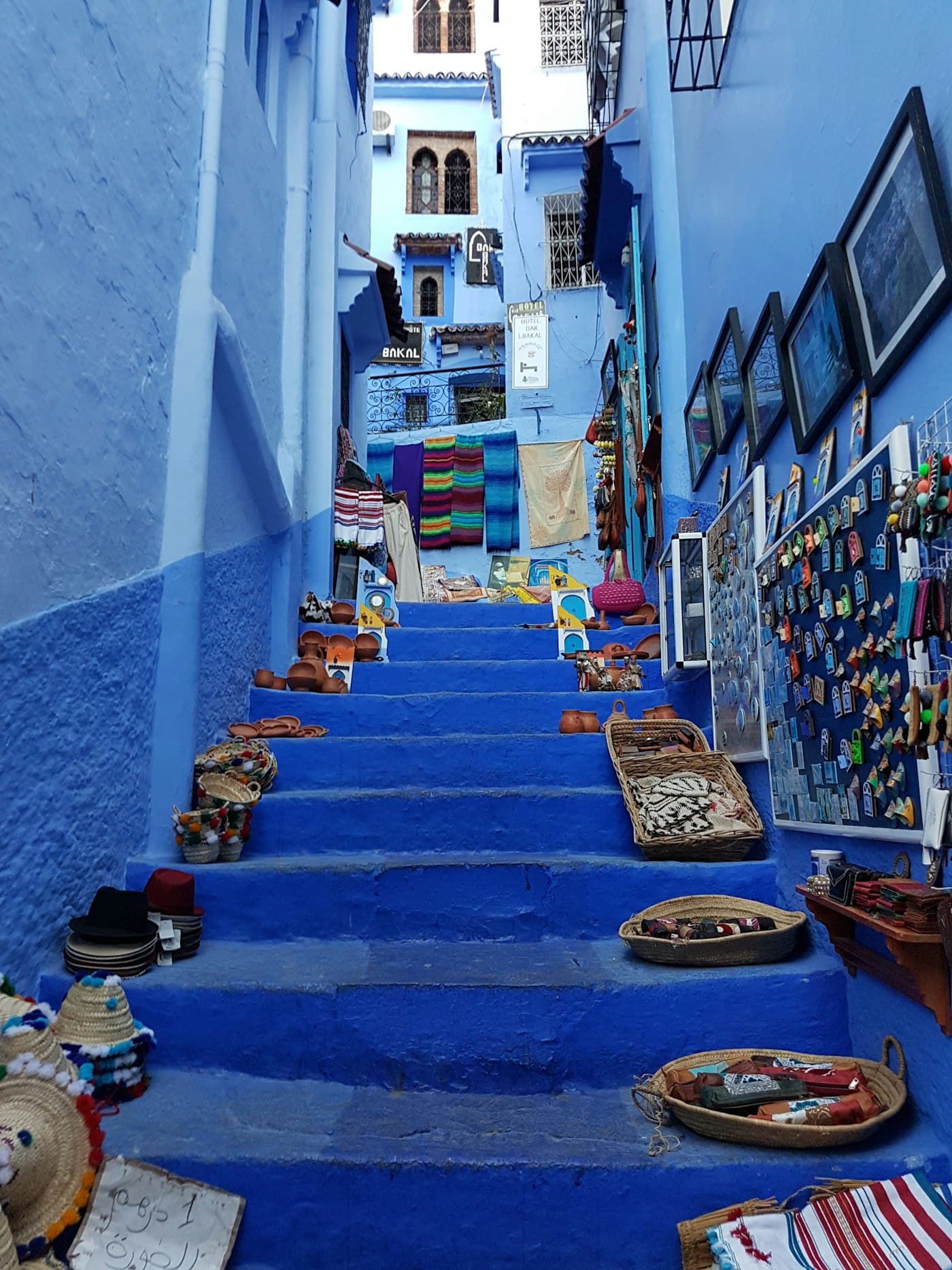 A steep blue-painted staircase in the Chefchaouen medina